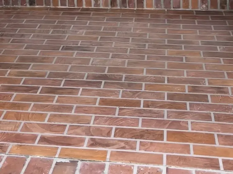 Close view of a brick-pattern decorative concrete overlay.