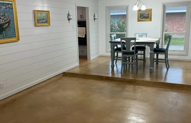 Stained concrete living and dining floor by Decorative Concrete of South Louisiana.