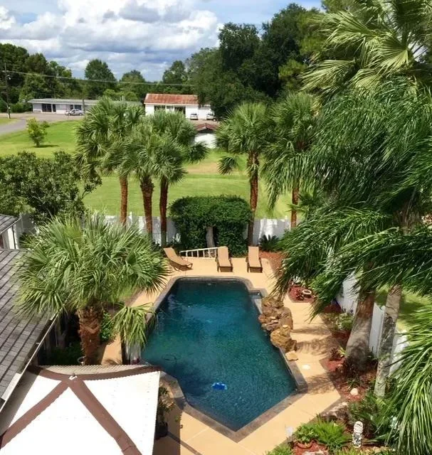 Pool deck overlay from above by Decorative Concrete of South Louisiana.