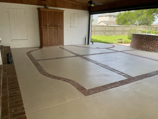 Another view of the same covered courtyard and brick divisions.