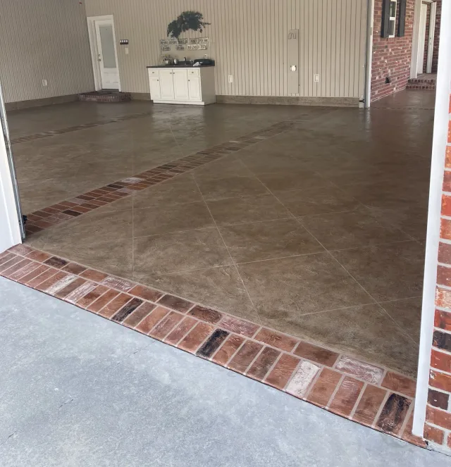 Garage overlay refurbishment by Decorative Concrete of South Louisiana.