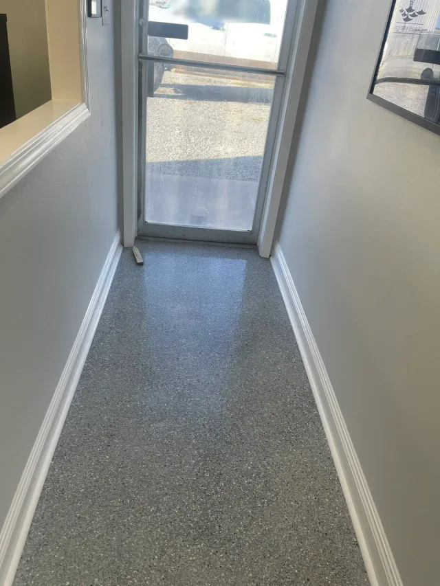 Commercial Entry Flake Floor by Decorative Concrete of South Louisiana.