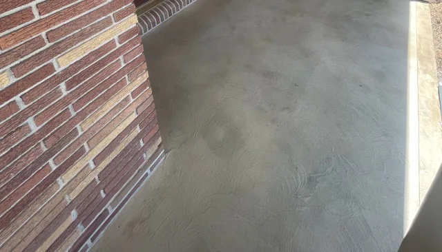 Neutral front porch overlay by Decorative Concrete of South Louisiana.
