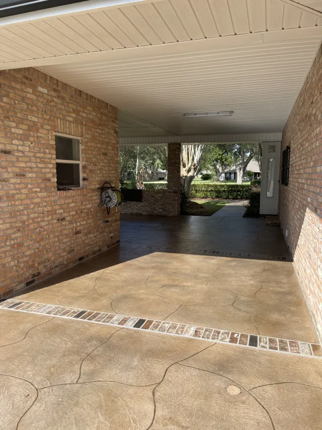 The same flagstone-style finish continuing into the covered brick courtyard.
