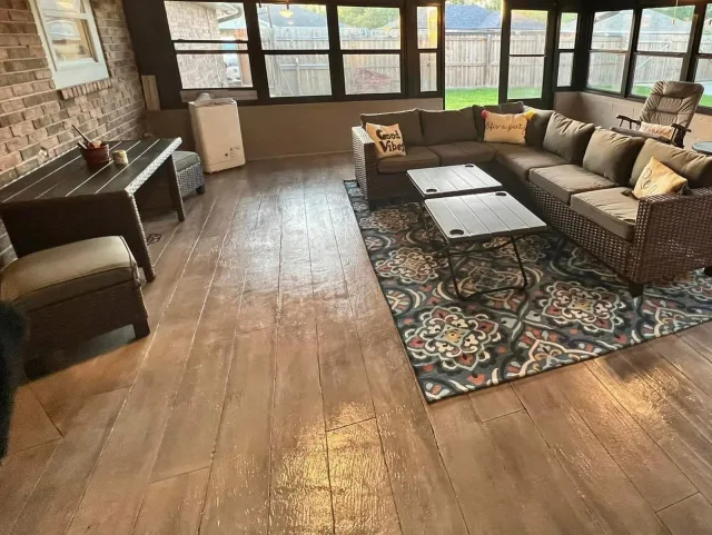 Wood-Look Sunroom Floor by Decorative Concrete of South Louisiana.