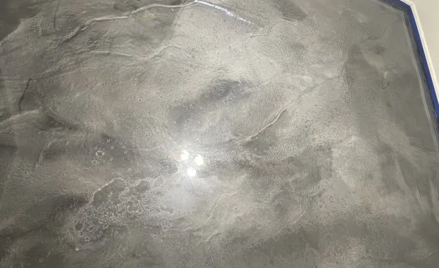 Marbled metallic office floor by Decorative Concrete of South Louisiana.